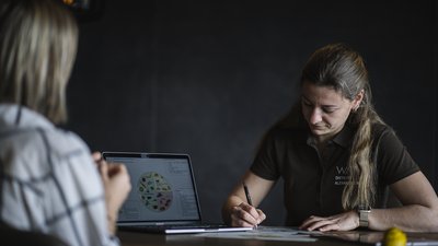 Photos from your hotel in Pfalzen in Val Pusteria/Pustertal Nutrition consultation with laptop and handwritten notes on table