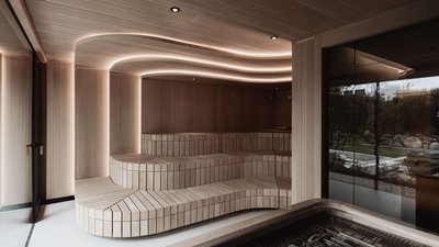 Photos from your hotel in Pfalzen in Val Pusteria/Pustertal Modern sauna room with wooden interior and indirect lighting