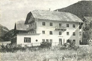 Historic photo of an inn in a rural mountain area