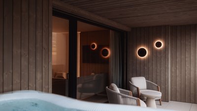 Photos from your hotel in Pfalzen in Val Pusteria/Pustertal Modern terrace with two chairs, table and hot tub with wood paneling