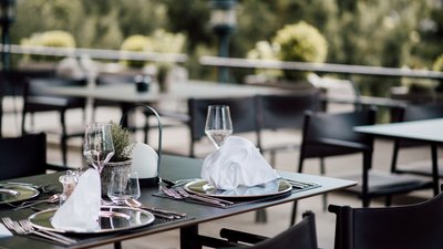 The best photos from our hotel in South Tyrol that kids love Elegant restaurant with set tables and folded white napkins