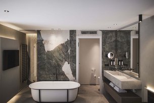 Modern bathroom with freestanding bathtub and double sink