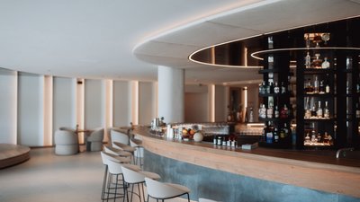 Photos from your hotel in Pfalzen in Val Pusteria/Pustertal Modern bar area with white stools and stylish ambiance