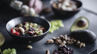 Photos from your hotel in Pfalzen in Val Pusteria/Pustertal Bowl with nuts, berries, avocado and fresh fruit on dark table