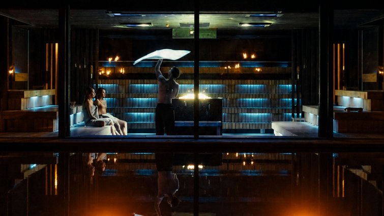 Hotel Solvie: a day spa in a class of its own Dark interior lit in blue, with two seated people and one person holding a white umbrella